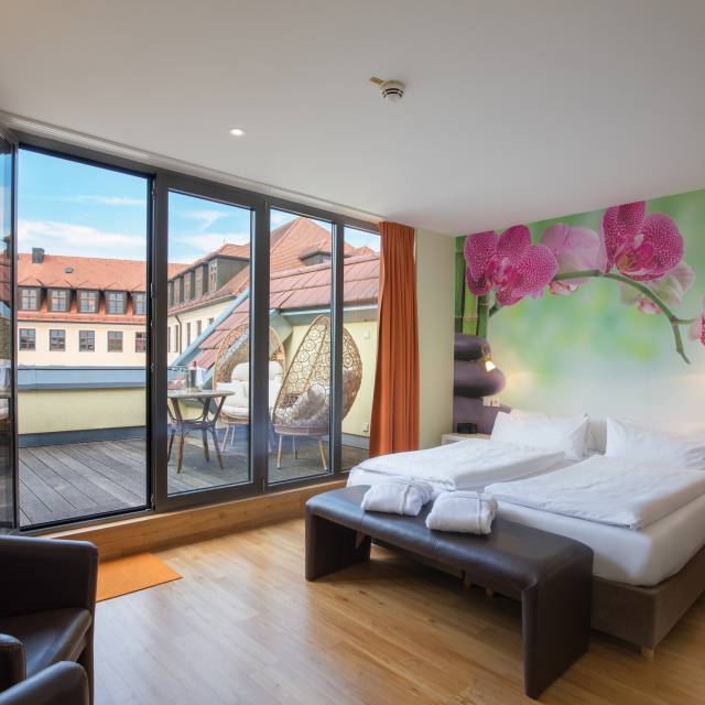 Wohnbereich mit Dachterrasse im Hotel Plankl in Altötting